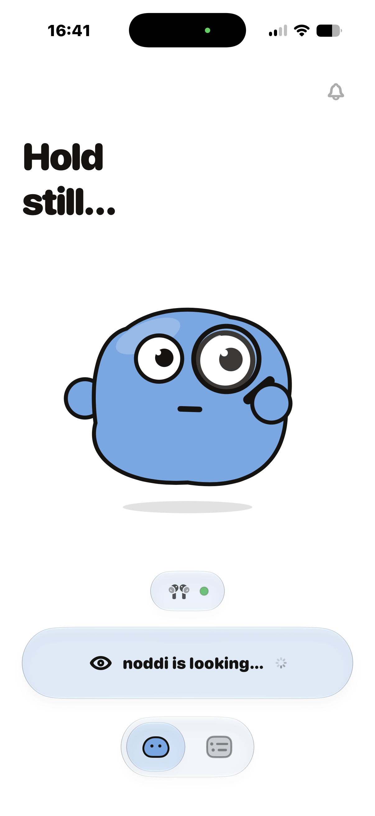Noddi scanning posture with its mascot holding a magnifying glass